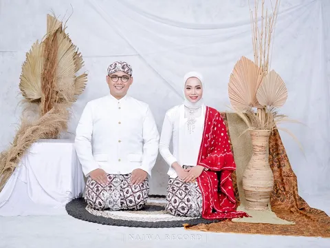 Foto sampul undangan Erma Wahyuni & Lucky Chandra