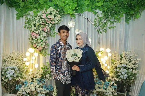 Foto sampul undangan Fajar & Isty