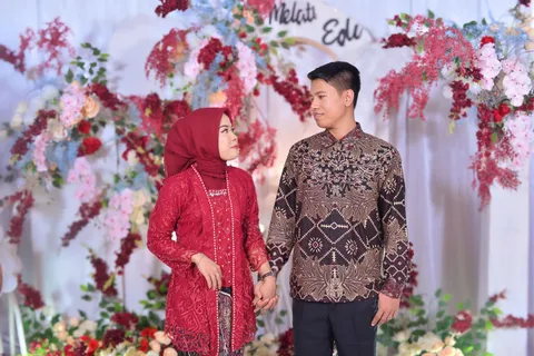 Foto sampul undangan Edi Zulkarnaen A.Md. & Melati S.A.P