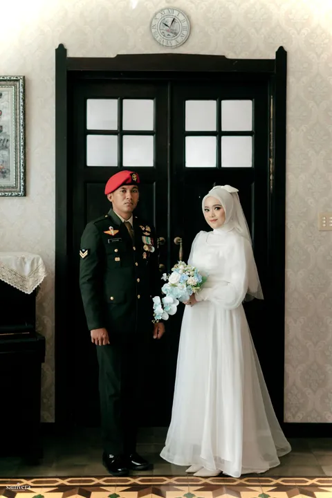 Foto sampul undangan Sadam & Ica