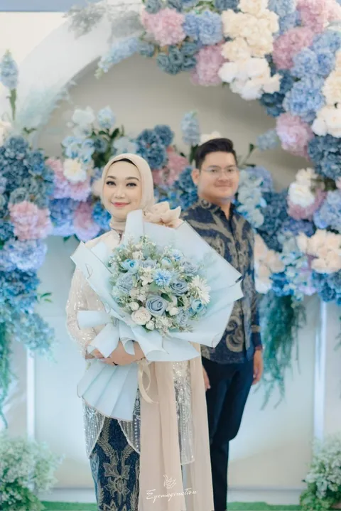 Foto sampul undangan Rezkita & Kevin