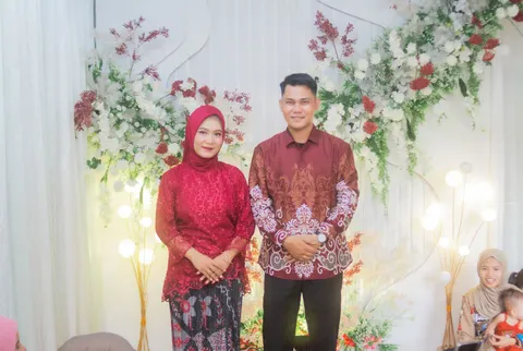 Foto sampul undangan Risal & Ade