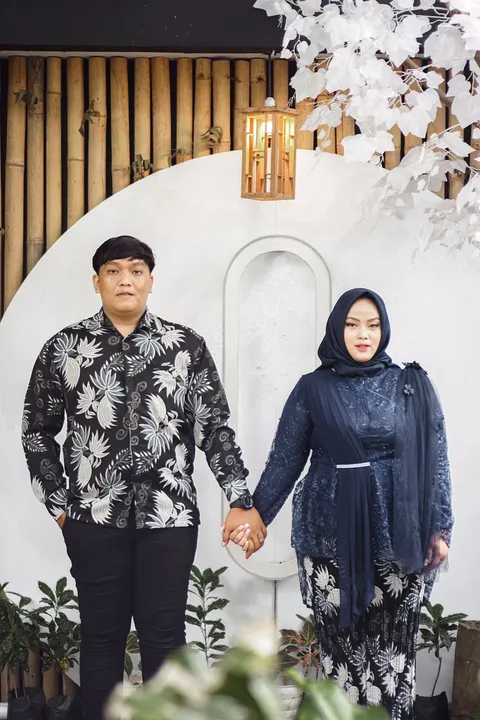 Foto sampul undangan Akhmal & Innes