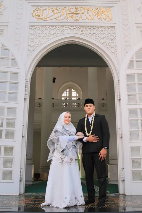 Foto sampul undangan Afif & Rika