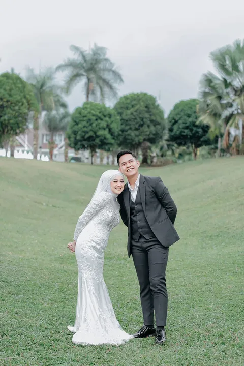 Foto sampul undangan Tari & Rizal