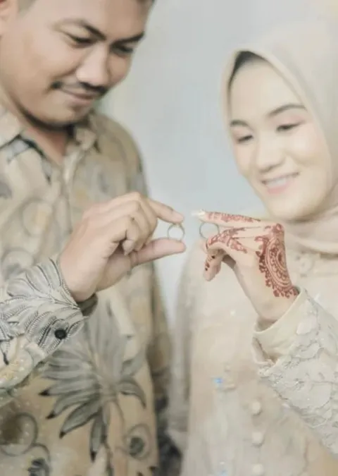 Foto sampul undangan Muti & Rey