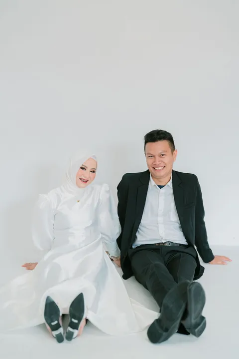 Foto sampul undangan Putri & Ricky