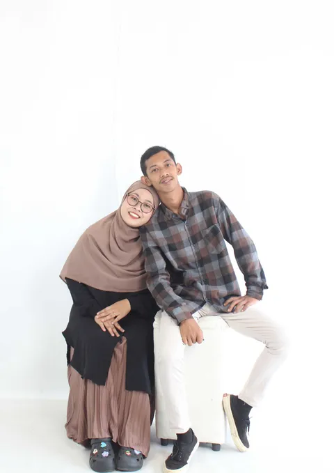 Foto sampul undangan 62838652800 & Andri