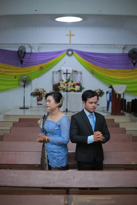 Foto sampul undangan Friska & Betman