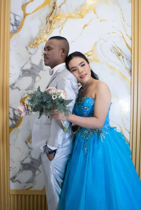 Foto sampul undangan Carolina Manurung & Julito Tefi