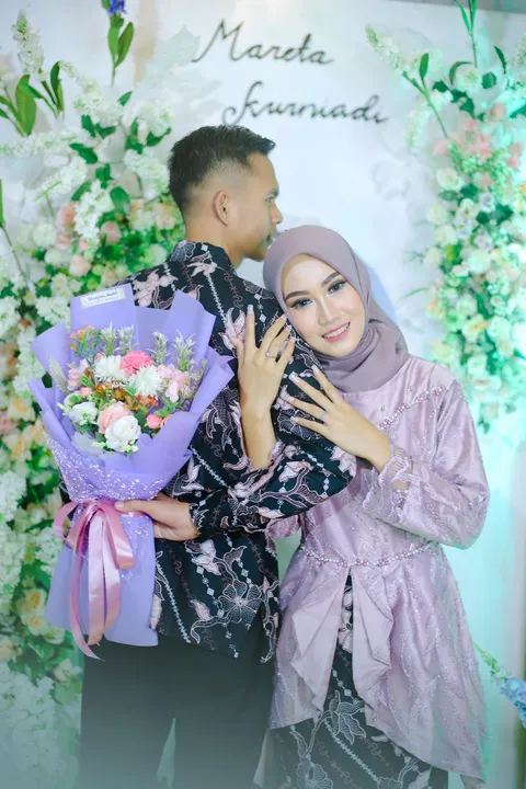 Foto sampul undangan Kurniadi & Mareta