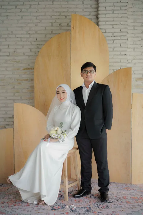 Foto sampul undangan Rizqi & Risky