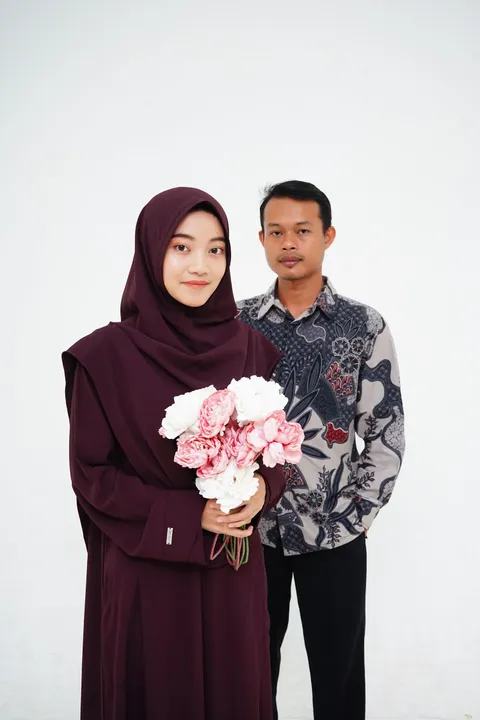 Foto sampul undangan Husni (Barok) & Aulia (Aul)