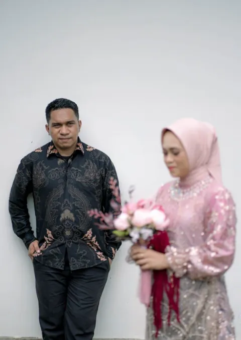 Foto sampul undangan Suci & Saiful