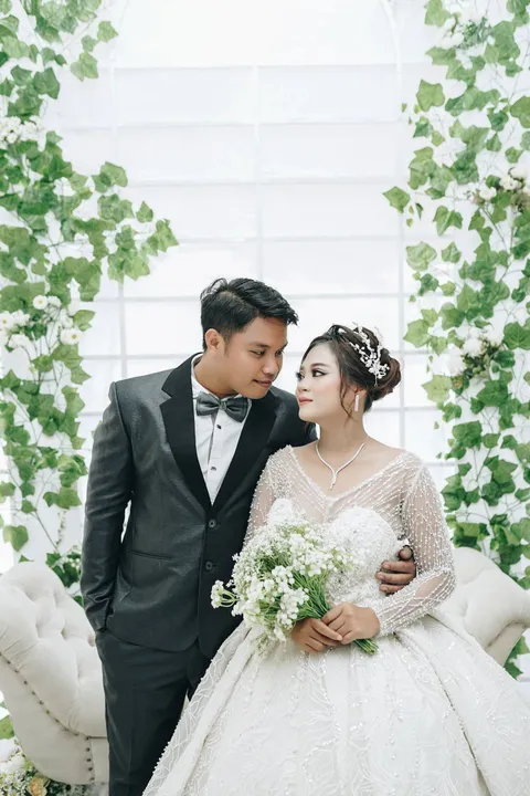 Foto sampul undangan Regina & Kevin